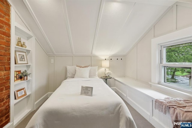 5 Laurel Pl, Glen Ridge, NJ 07028 - bedroom featuring a decorative wall, vaulted ceiling, and carpet