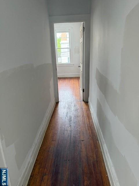 457 7th St, Newark, NJ 07107 - corridor with wood-type flooring and baseboards