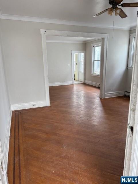457 7th St, Newark, NJ 07107 - spare room featuring a ceiling fan, ornamental molding, wood finished floors, and baseboards