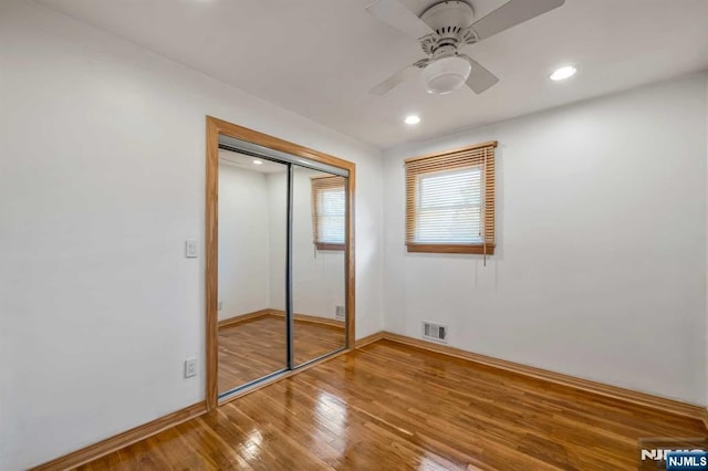 8 Carlisle Ct, Edison, NJ 08817 - unfurnished bedroom featuring hardwood / wood-style flooring, baseboards, a closet, recessed lighting, and a ceiling fan