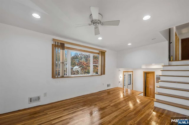 8 Carlisle Ct, Edison, NJ 08817 - unfurnished living room with ceiling fan, stairway, recessed lighting, and wood finished floors