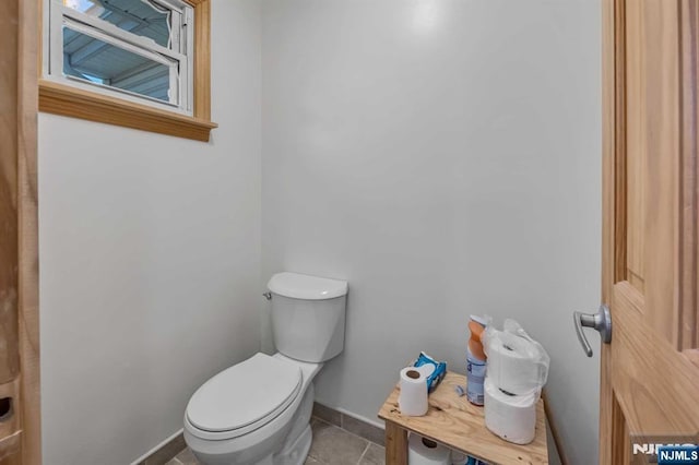 8 Carlisle Ct, Edison, NJ 08817 - bathroom with toilet, baseboards, and tile patterned floors