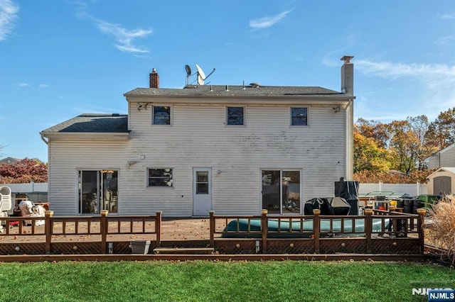 8 Carlisle Ct, Edison, NJ 08817 - rear view of property featuring a deck and a chimney