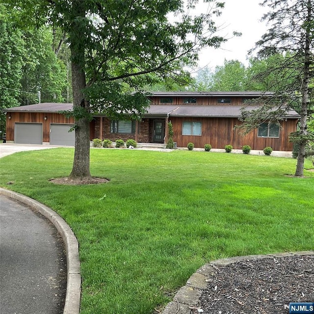 625 Roberge Dr, River Vale, NJ 07675 - view of front of property with driveway, a front yard, and an attached garage