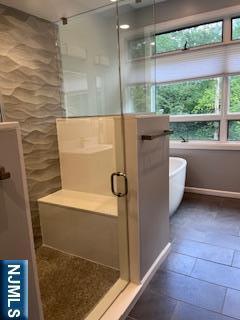 625 Roberge Dr, River Vale, NJ 07675 - full bath featuring a stall shower and a freestanding tub