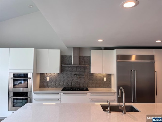 625 Roberge Dr, River Vale, NJ 07675 - kitchen with appliances with stainless steel finishes, a sink, modern cabinets, white cabinetry, and recessed lighting
