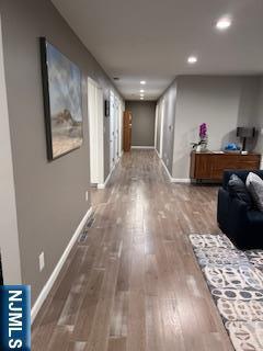 625 Roberge Dr, River Vale, NJ 07675 - hall featuring baseboards, wood finished floors, and recessed lighting