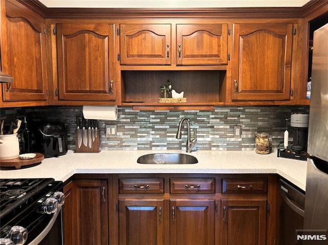 25 Osprey Unit G310, Hackettstown, NJ 07840 - kitchen with appliances with stainless steel finishes, a sink, light countertops, tasteful backsplash, and open shelves