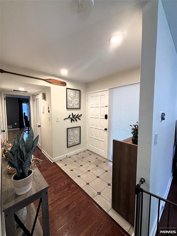 25 Osprey Unit G310, Hackettstown, NJ 07840 - entryway featuring baseboards and light wood-type flooring