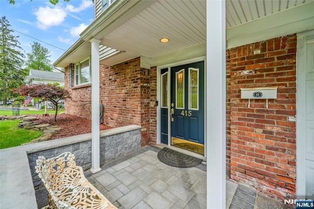 415 Briarwood Ln, Northvale, NJ 07647 - property entrance featuring brick siding and a porch