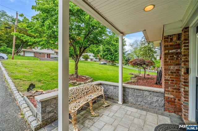 415 Briarwood Ln, Northvale, NJ 07647 - porch featuring a lawn