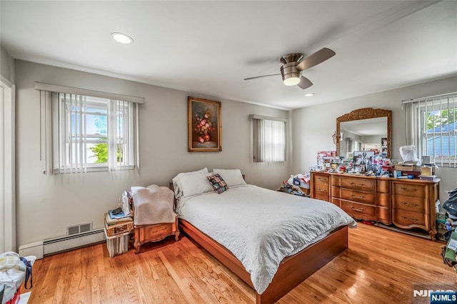 415 Briarwood Ln, Northvale, NJ 07647 - bedroom with baseboard heating, light wood-type flooring, recessed lighting, and a ceiling fan