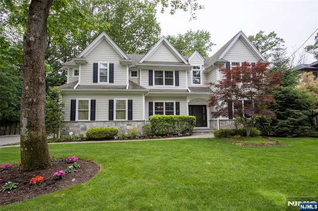 77 Ross Ave, Demarest, NJ 07627 - view of front of house with stone siding and a front yard