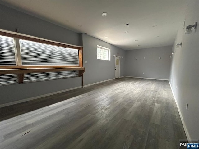 207 Tremont Ave, East Orange, NJ 07018 - unfurnished room with baseboards, wood finished floors, and recessed lighting