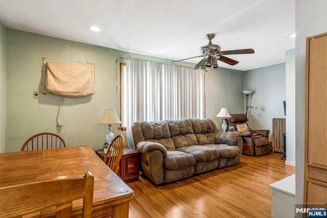 542 3rd Ave, Lyndhurst, NJ 07071 - living area with radiator, ceiling fan, light wood finished floors, and recessed lighting