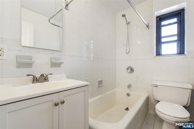 2333 Hudson Ter Unit A4, Fort Lee, NJ 07024 - bathroom featuring tile walls, shower / bathtub combination, toilet, vanity, and tile patterned floors