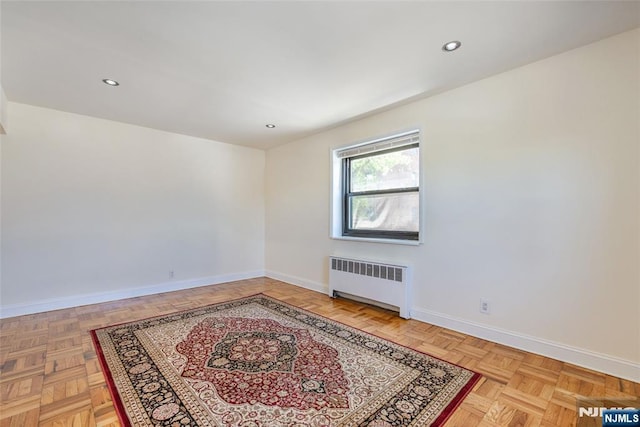 2333 Hudson Ter Unit A4, Fort Lee, NJ 07024 - spare room featuring radiator, baseboards, and recessed lighting