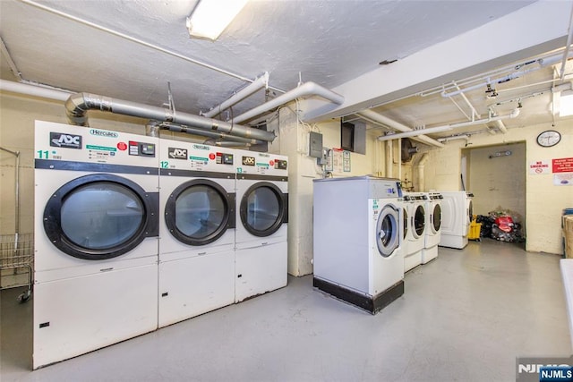 2333 Hudson Ter Unit A4, Fort Lee, NJ 07024 - shared laundry room with washing machine and clothes dryer