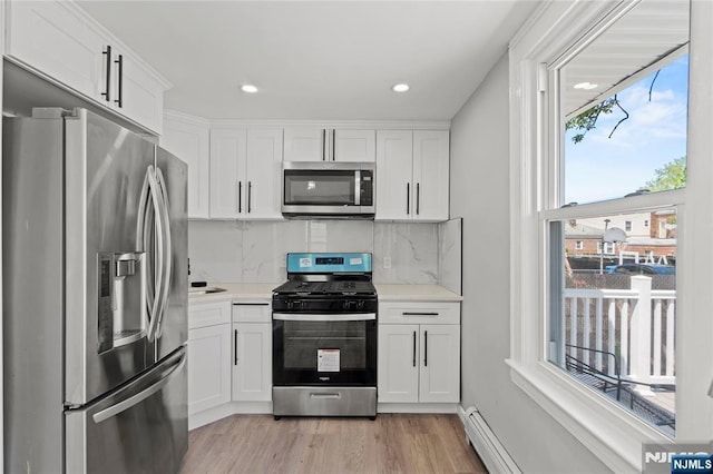 190 Washington Ave, Hackensack, NJ 07601 - kitchen featuring stainless steel appliances, plenty of natural light, light countertops, and recessed lighting