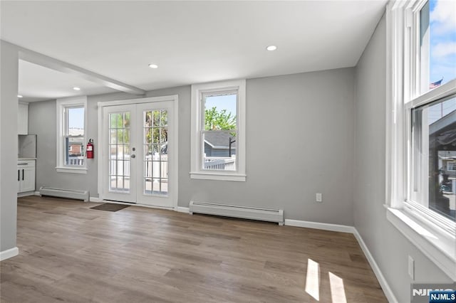 190 Washington Ave, Hackensack, NJ 07601 - entryway featuring baseboard heating, baseboards, wood finished floors, and recessed lighting
