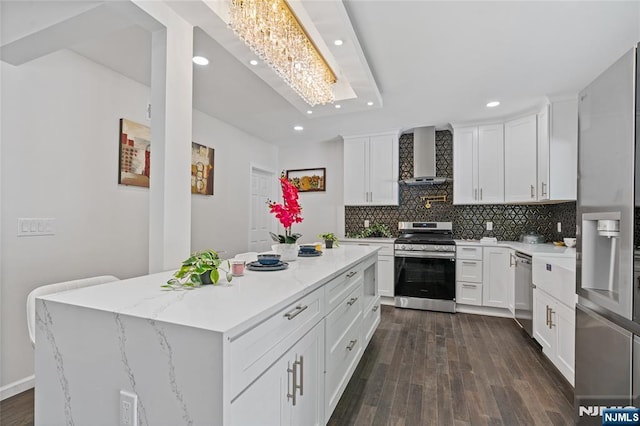 254 Springfield Ave, Rutherford, NJ 07070 - kitchen featuring stainless steel appliances, wall chimney range hood, recessed lighting, backsplash, and dark wood-type flooring