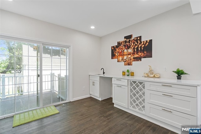 254 Springfield Ave, Rutherford, NJ 07070 - indoor wet bar with dark wood-type flooring, recessed lighting, and baseboards