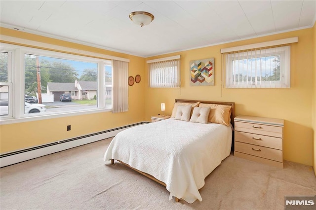 99 Comly Rd, Lincoln Park Borough, NJ 07035 - bedroom featuring a baseboard radiator, light carpet, and crown molding