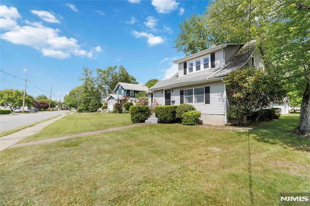 99 Comly Rd, Lincoln Park Borough, NJ 07035 - view of front of property with a front lawn