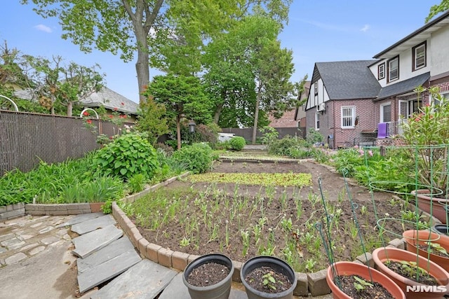 497 Oakdene Ave, Ridgefield, NJ 07657 - fenced backyard with a garden