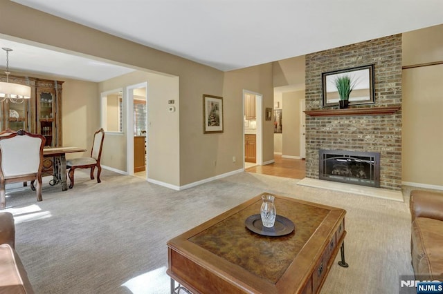65 Cummings Ct, Mahwah, NJ 07430 - living room with light colored carpet, baseboards, and a fireplace