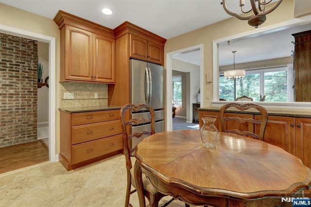65 Cummings Ct, Mahwah, NJ 07430 - dining area featuring a chandelier, healthy amount of natural light, recessed lighting, and baseboards