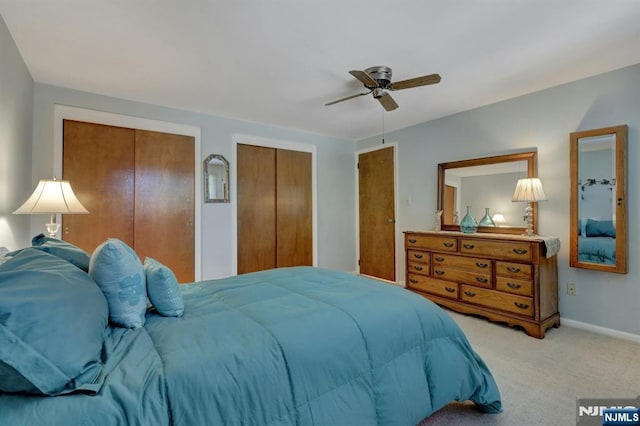 65 Cummings Ct, Mahwah, NJ 07430 - bedroom featuring multiple closets, carpet floors, a ceiling fan, and baseboards