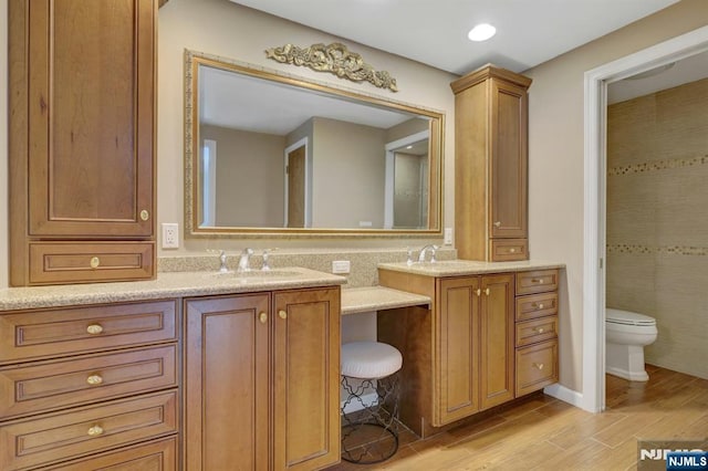 65 Cummings Ct, Mahwah, NJ 07430 - full bathroom with vanity, toilet, and wood finished floors
