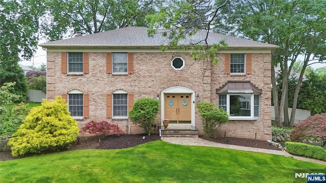 20 Tuxedo Ave, Park Ridge, NJ 07656 - view of front of home with brick siding, a chimney, roof with shingles, and entry steps