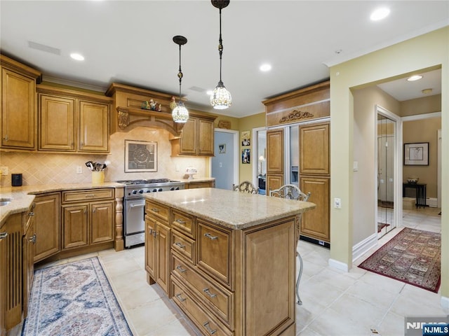 20 Tuxedo Ave, Park Ridge, NJ 07656 - kitchen with high end stainless steel range oven, decorative backsplash, light stone counters, crown molding, and recessed lighting