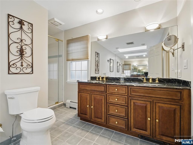 20 Tuxedo Ave, Park Ridge, NJ 07656 - bathroom featuring baseboard heating, toilet, a shower stall, double vanity, and tile patterned floors