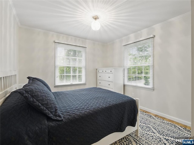 20 Tuxedo Ave, Park Ridge, NJ 07656 - bedroom featuring crown molding, baseboards, and wood finished floors