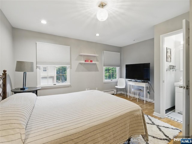 20 Tuxedo Ave, Park Ridge, NJ 07656 - bedroom with wood finished floors, a baseboard heating unit, baseboards, and recessed lighting