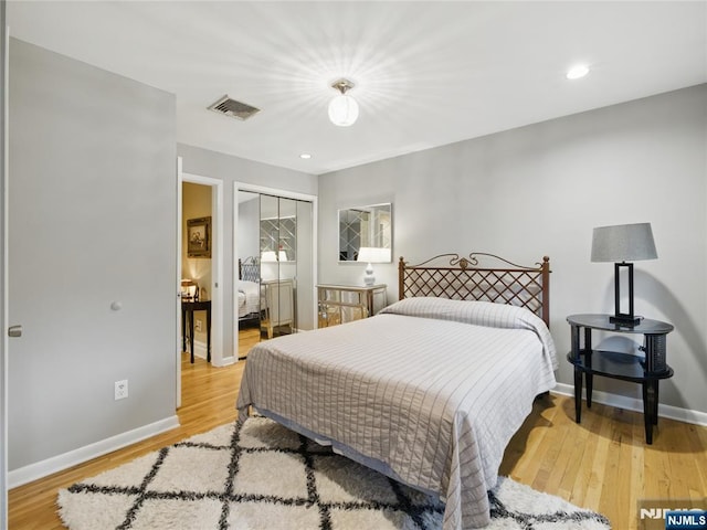 20 Tuxedo Ave, Park Ridge, NJ 07656 - bedroom featuring light wood finished floors, a closet, baseboards, and recessed lighting