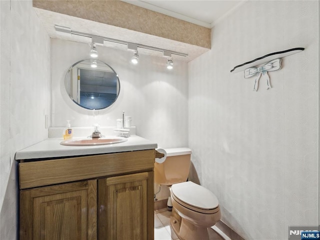 20 Tuxedo Ave, Park Ridge, NJ 07656 - bathroom with vanity, toilet, and tile patterned floors