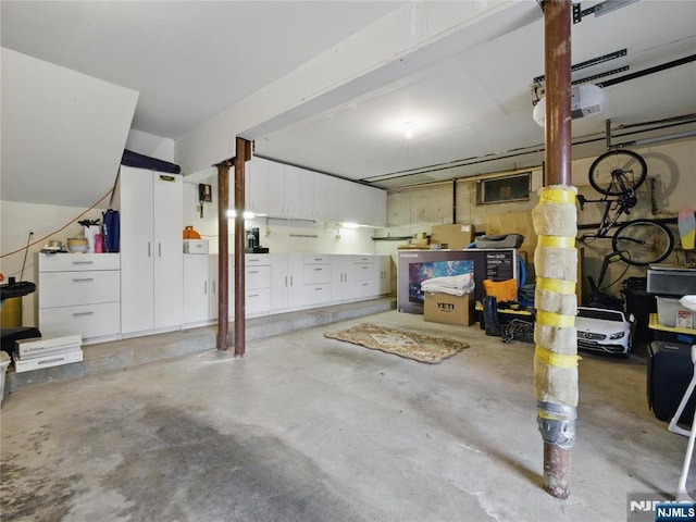 20 Tuxedo Ave, Park Ridge, NJ 07656 - garage featuring a garage door opener