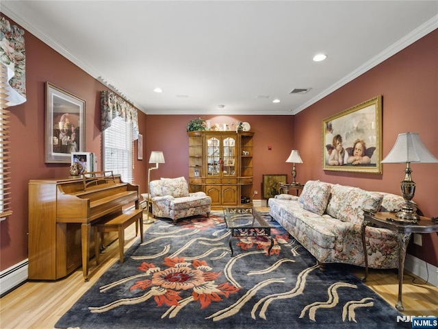 20 Tuxedo Ave, Park Ridge, NJ 07656 - living room with wood finished floors, a baseboard heating unit, ornamental molding, recessed lighting, and baseboards