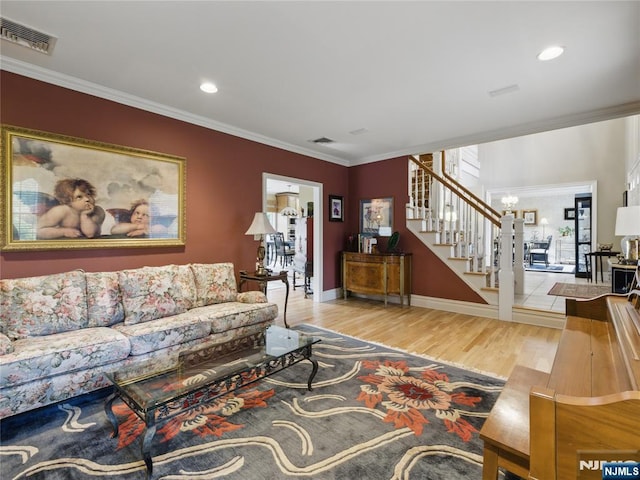 20 Tuxedo Ave, Park Ridge, NJ 07656 - living room featuring stairway, ornamental molding, wood finished floors, recessed lighting, and baseboards
