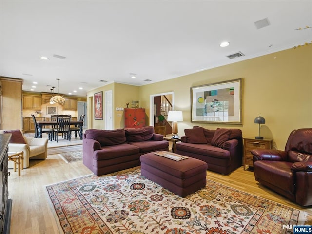 20 Tuxedo Ave, Park Ridge, NJ 07656 - living area featuring light wood-style floors, recessed lighting, and ornamental molding