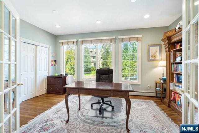 50 Claremont Rd, Fort Lee, NJ 07024 - office space with wood finished floors, french doors, healthy amount of natural light, a baseboard heating unit, and recessed lighting