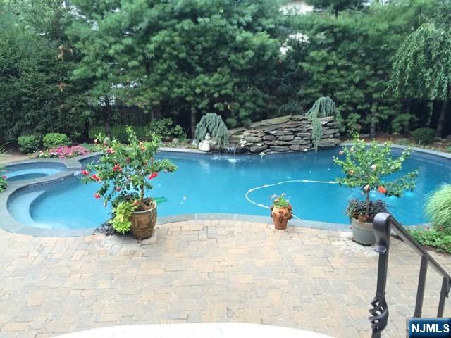 50 Claremont Rd, Fort Lee, NJ 07024 - view of swimming pool featuring a pool with connected hot tub
