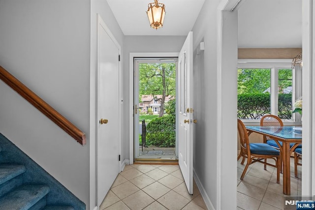 15 Strawberry Hill Rd, Hillsdale, NJ 07642 - entryway featuring light tile patterned flooring, stairway, and baseboards