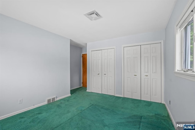 15 Strawberry Hill Rd, Hillsdale, NJ 07642 - unfurnished bedroom featuring carpet floors, multiple closets, and baseboards