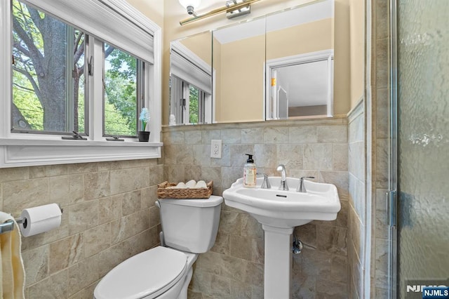 15 Strawberry Hill Rd, Hillsdale, NJ 07642 - full bath with toilet, tile walls, and a shower with door