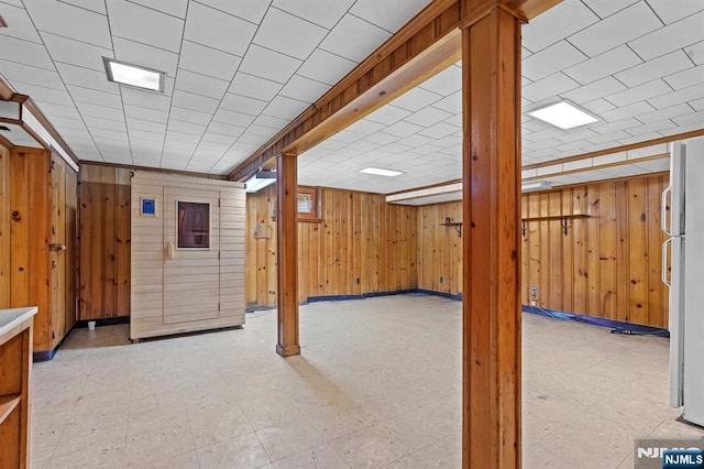 15 Strawberry Hill Rd, Hillsdale, NJ 07642 - finished basement with wood walls and freestanding refrigerator